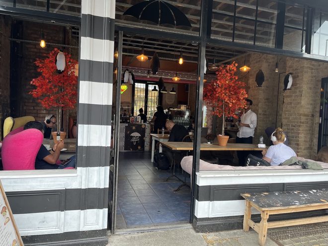The open frontage with customers seated inside